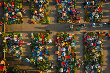 Obraz premium Aerial view of busy local daily life of the morning local market in Vi Thanh or Chom Hom market, Mekong Delta, Vietnam.