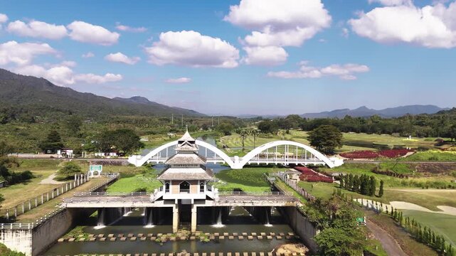 Fly over Tha Chomphu White bridge in Thailand
