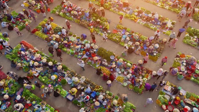 Aerial view of busy local daily life of the morning local market in Vi Thanh or Chom Hom market, Mekong Delta, Vietnam.