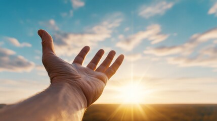 Reaching for the sun a hand reaches out nature landscape sunset sky inspirational viewpoint