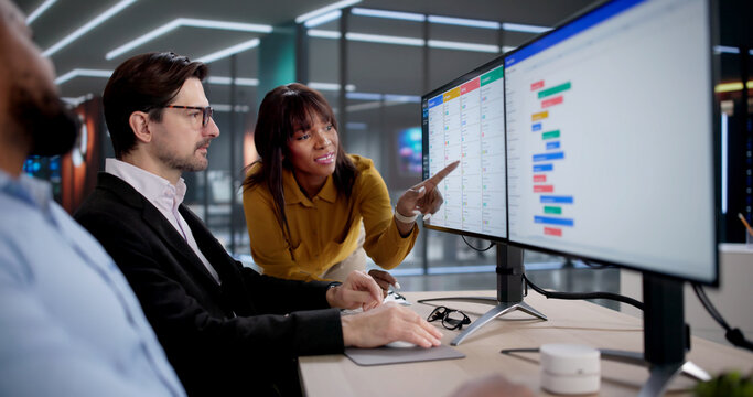 Diverse Team Uses Kanban Software To Manage Schedules And Projects Efficiently