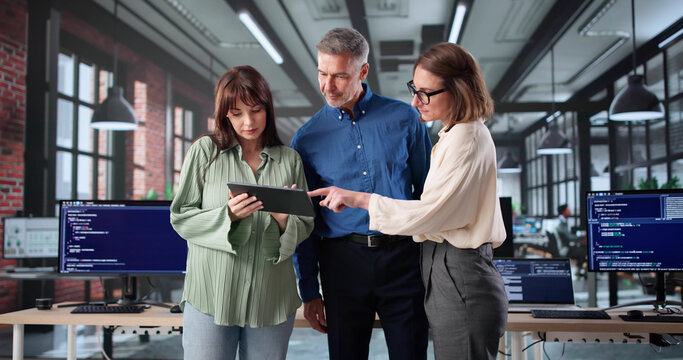 Senior Web Developers Program Code In Classroom Meeting