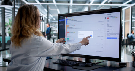 Woman Working On Diagnostics And Security Compliance