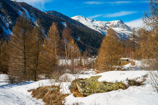 Trekking path near the village of Lillaz. Lillaz is a small village in the Cogne valley, side branch of the main Aosta valley (Northern Italy), at the foot of the Gran Paradiso massif.