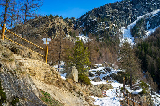 Trekking path near the village of Lillaz. Lillaz is a small village in the Cogne valley, side branch of the main Aosta valley (Northern Italy), at the foot of the Gran Paradiso massif.