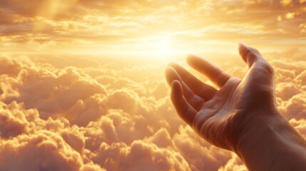 Reaching for the light a hand extended towards the golden horizon amidst cloudy skies