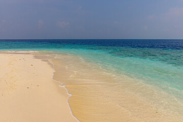 tropical beach with blue sky