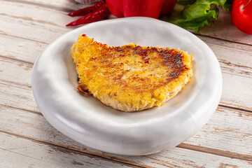 Breaded crispy chicken schnitzel