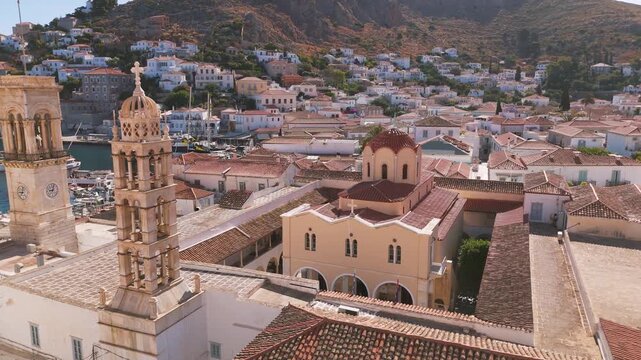 Scenic view of Hydra church and town under clear skies, showing serenity