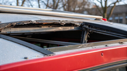 Bus transportation double decker accident roof damage urban street scene closeup detail visible