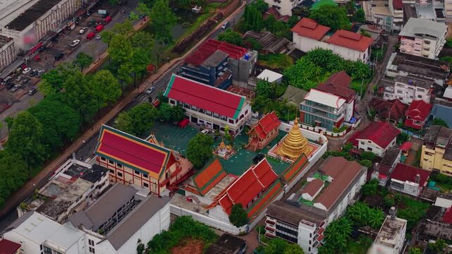 Aerial view golden Wat Phra Singh Woramahaviharn Temple, Buddhist pagoda in Chiang Mai, Thailand.