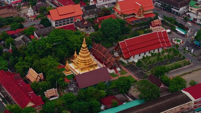 Aerial view golden Wat Phra Singh Woramahaviharn Temple, Buddhist pagoda in Chiang Mai, Thailand.