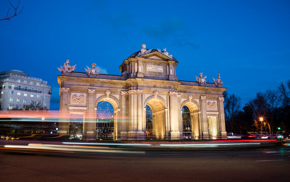 Puerta de Alcala illuminated at night in Madrid Spain