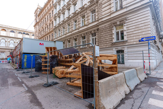 Vienna, Austria - February 24, 2026: Vienna Street Construction Site with Scaffolding and Historic Facade