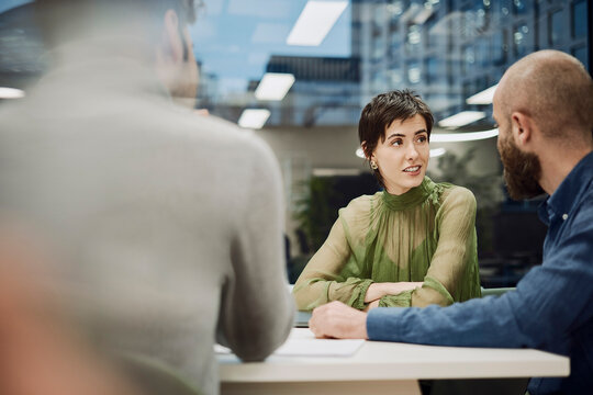 Business meeting in a modern London office during the evening