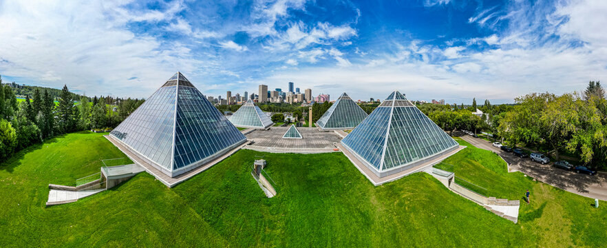 Aerial view of Muttart Conservatory pyramids and Edmonton skyline