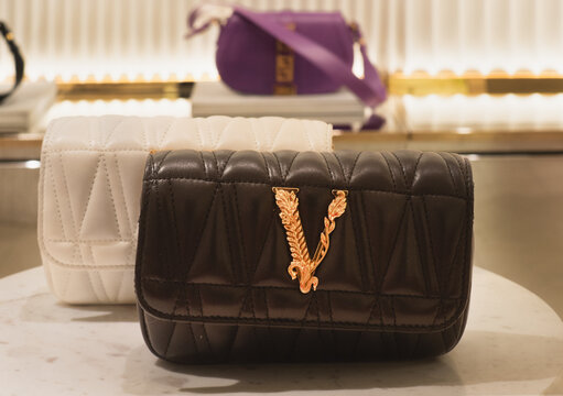 Versace Virtus clutch bag in black quilted leather with golden V logo on the front.Milan - Italy,20 February 2026