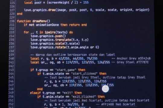 Script code on monitor, closeup. Software development concept