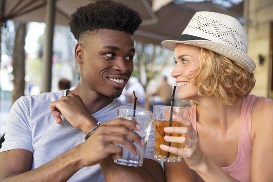 friends having a drinki outdoors