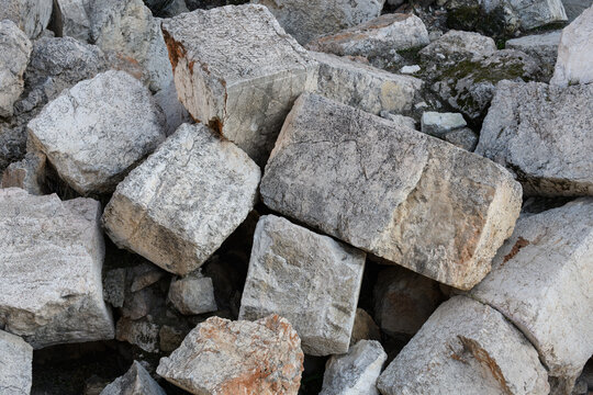 Closeup of a pile of giant stones at the base of the Western Wall in Jerusalem, beneath Robinson's Arch, believed to be ruins of the Second Jewish Temple, destroyed by the Romans in 70 AD.