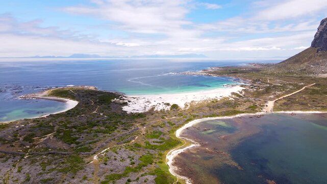 Aerial riser view over skuitbaai and white sand Moonlight Beach at Pringle Bay