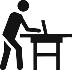 Fototapeta premium Modern professional diligently working on a laptop computer at an ergonomic standing desk