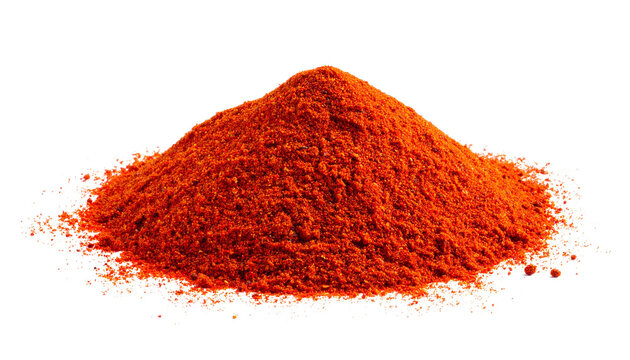 Vibrant red chili powder pile isolated on solid white background1