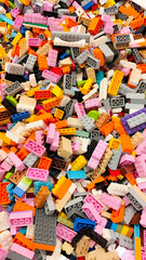 Naklejka premium Top view of pile of various colorful authentic Lego plastic bricks and building blocks on January 3, 2026 in Bangkok, Thailand.