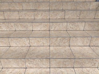 Obraz premium Beige Marble Look Porcelain Tiled Stairs Background