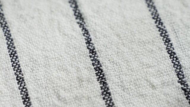 Textured striped fabric close up footage. Texture and background.