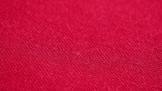 Soft red cotton. The concept of design, natural fabrics for comfortable everyday.