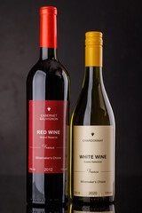 Red and white wine bottles mockup on dark