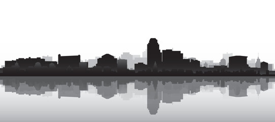 Black and white panoramic poster of the city skyline with misty background buildings and water reflection of TIJUANA, MEXICO