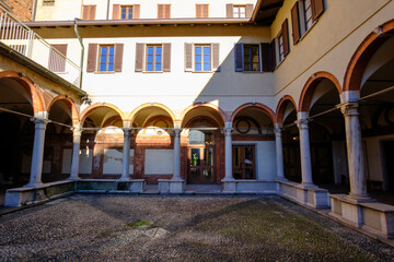 Fototapeta premium Exterior of the historic Santa Maria alla Fontana church in Milan, Italy. A cloister