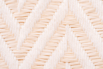 Obraz premium Light beige woven texture background, natural fabric pattern close up with copy space.