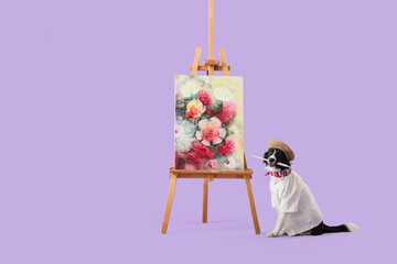 Cute Border Collie dog in artist's beret with paint brush and easel on lilac background