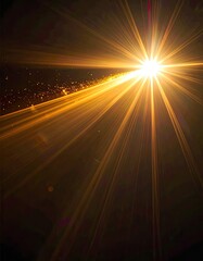 Obraz premium Brilliant golden light burst radiating outwards against a dark background.