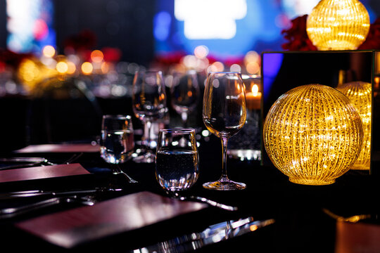 Elegant Dinner Table Setting with Glowing Orb Centerpiece