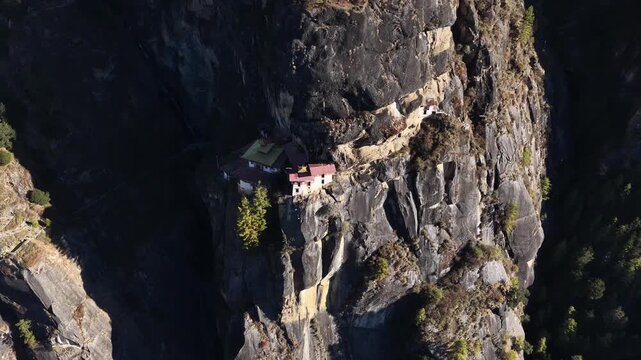 Aerial view of the historic Tiger's Nest Monastery perched on a cliffside, a sacred and iconic landmark, Taktsang, Paro, Bhutan.