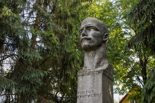 Monument to Viktor Kingisepp, Kingisepp, Leningrad Oblast, Russia - June 27, 2021. A sculptural portrait of the revolutionary Viktor Eduardovich Kingisepp, after whom the city is named.