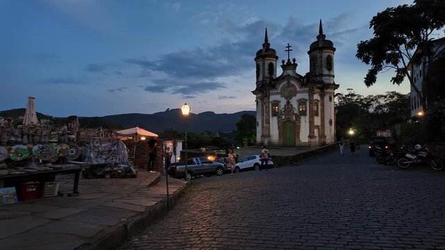 Ouro Preto, Brazil: Point of view footage of a tourist who walk toward the Church of Saint Francis of Assisi in middle of Ouro Preto colonial old town, state in Minas Gerais , Brazi