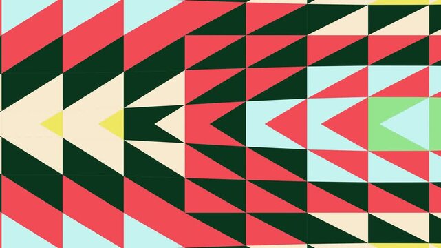 Geometric pattern with triangles and arrows in various colors and directions viewed from directly above