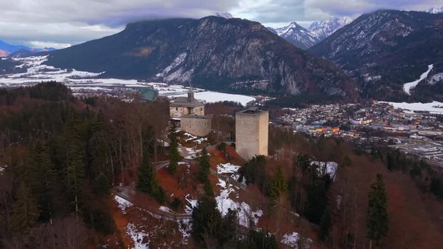 Drone footage of Burg Thierberg, medieval hilltop castle near Kufstein, Austria. Luftaufnahme von Thierbergkapelle und Burg Thierberg. Historic fortress ruins on hill in Tirol, Oesterreich.