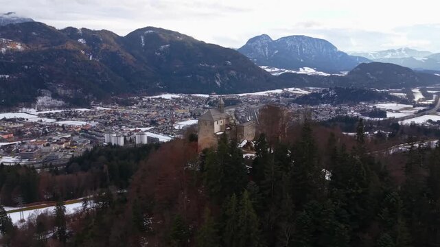 Winter aerial of Thierberg Castle ruins in Tyrol, Austria. Elevated viewpoint above Inn Valley offering scenic views of Kufstein, alpine ridges and snow covered landscapes. Luftaufnahme Burg Thierberg