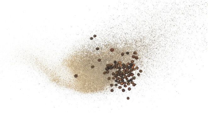 Black ground and whole pepper flying, isolated on white, clipping path