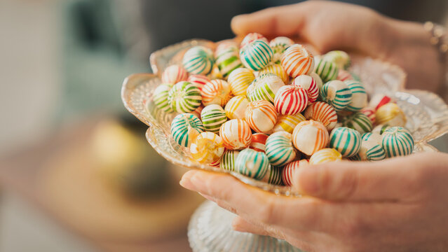 Visiting relatives and offering candy during Eid al-Fitr celebration