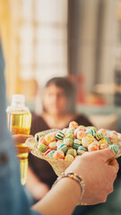 Visiting relatives and offering candy during Eid al-Fitr celebration