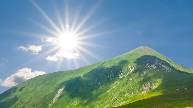 Hoverla mount top  under a sparkle sun time lapse scene