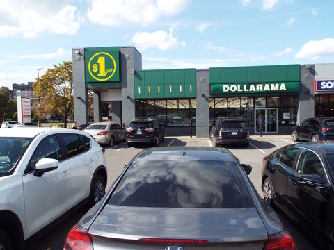 Ottawa, Ontario, Canada-July 17, 2025: The storefront of a "Dollarama" retail location at 2515 Bank Street.