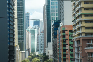 Cityscape and skyline. Buildings right next to each other and overlapping in the view. Urban development and progress.